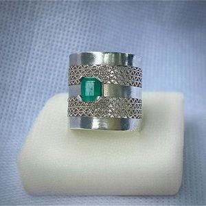 Handmade Filagree Ring in Sterling Silver featuring a .75c Emerald Cut Emerald